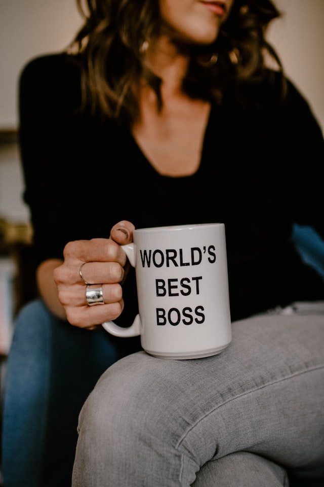 boss lady holding a mug